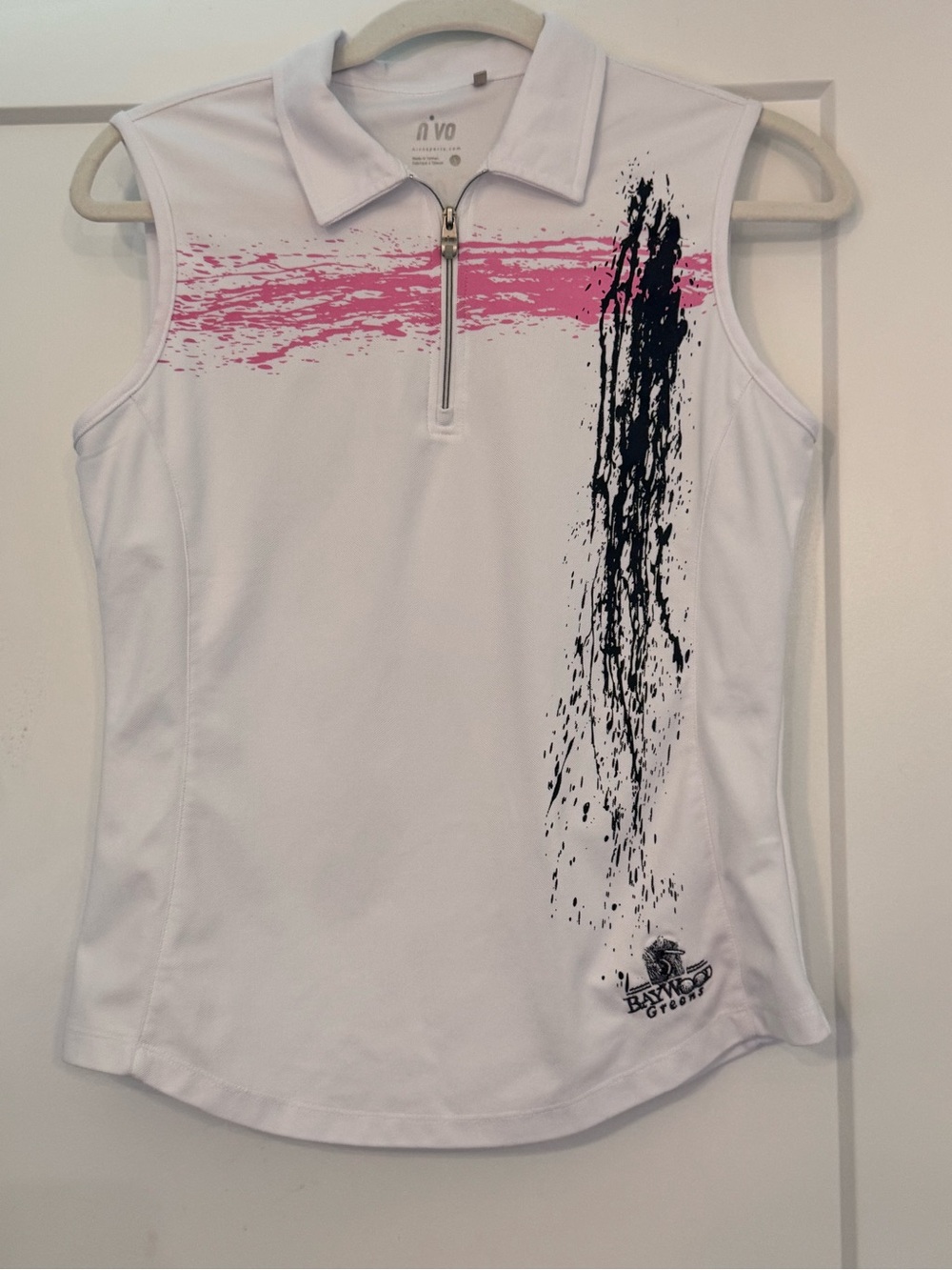 NIVO Sleeveless Zip Golf Polo in White with Pink & Black Accents